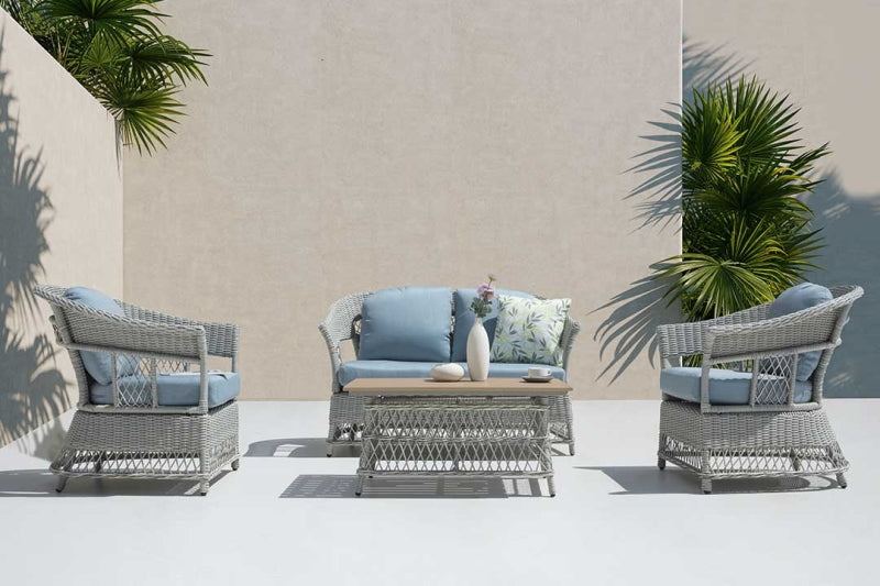 Shell 4-Piece Wicker Patio Sofa Set with Loveseat, Chairs & Wood-Look Table – Blue Cushions